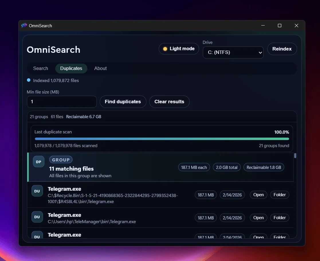 OmniSearch 重复文件查找界面,展示分组结果和可释放空间